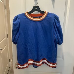 QUEEN OF SPARKLES Blue Top with Orange and White Trim